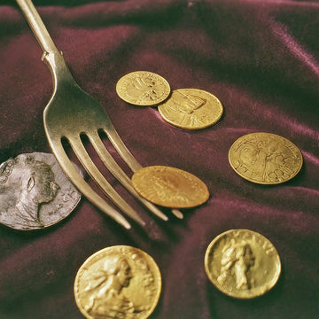 The History and Allure of Gold Collectibles: From Ancient Times to Modern American Fork Collections
