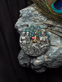 Decorative plaque with artistic design on a stone surface