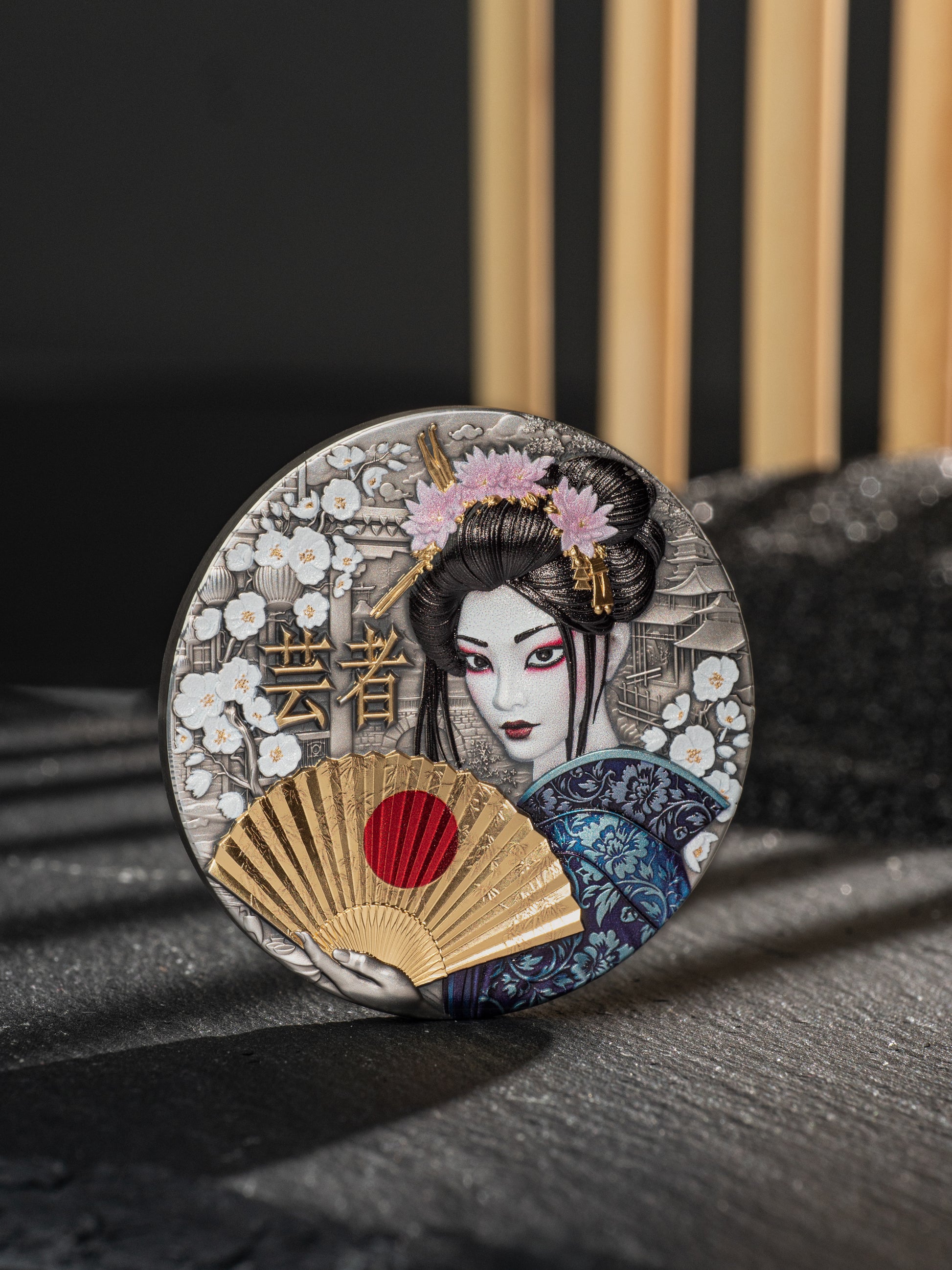 Decorative coaster with a geisha design on a dark surface