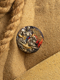 Decorative button with 'Aladdin and the Wonderful Lamp' design on a textured beige background