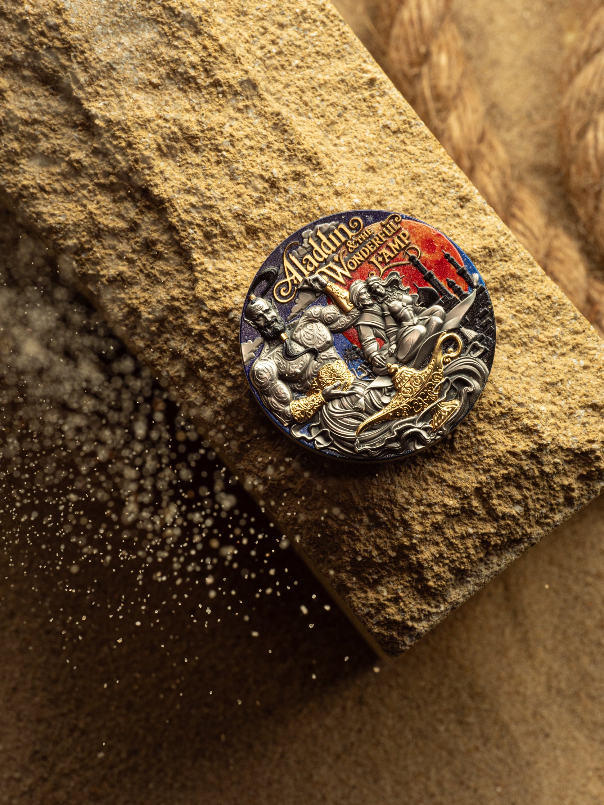Decorative button with intricate design on a textured surface
