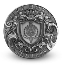 Silver coin with intricate designs and text on a white background