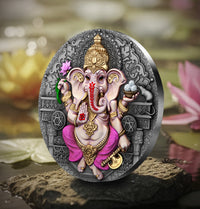Decorative plaque with an elephant god figure on a blurred natural background