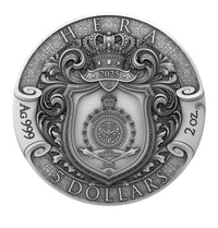 Silver coin with intricate design and 'Hera' branding on a white background