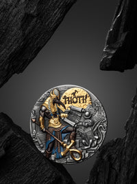 Decorative coin with intricate design and 'THOTH' branding on a dark rocky background