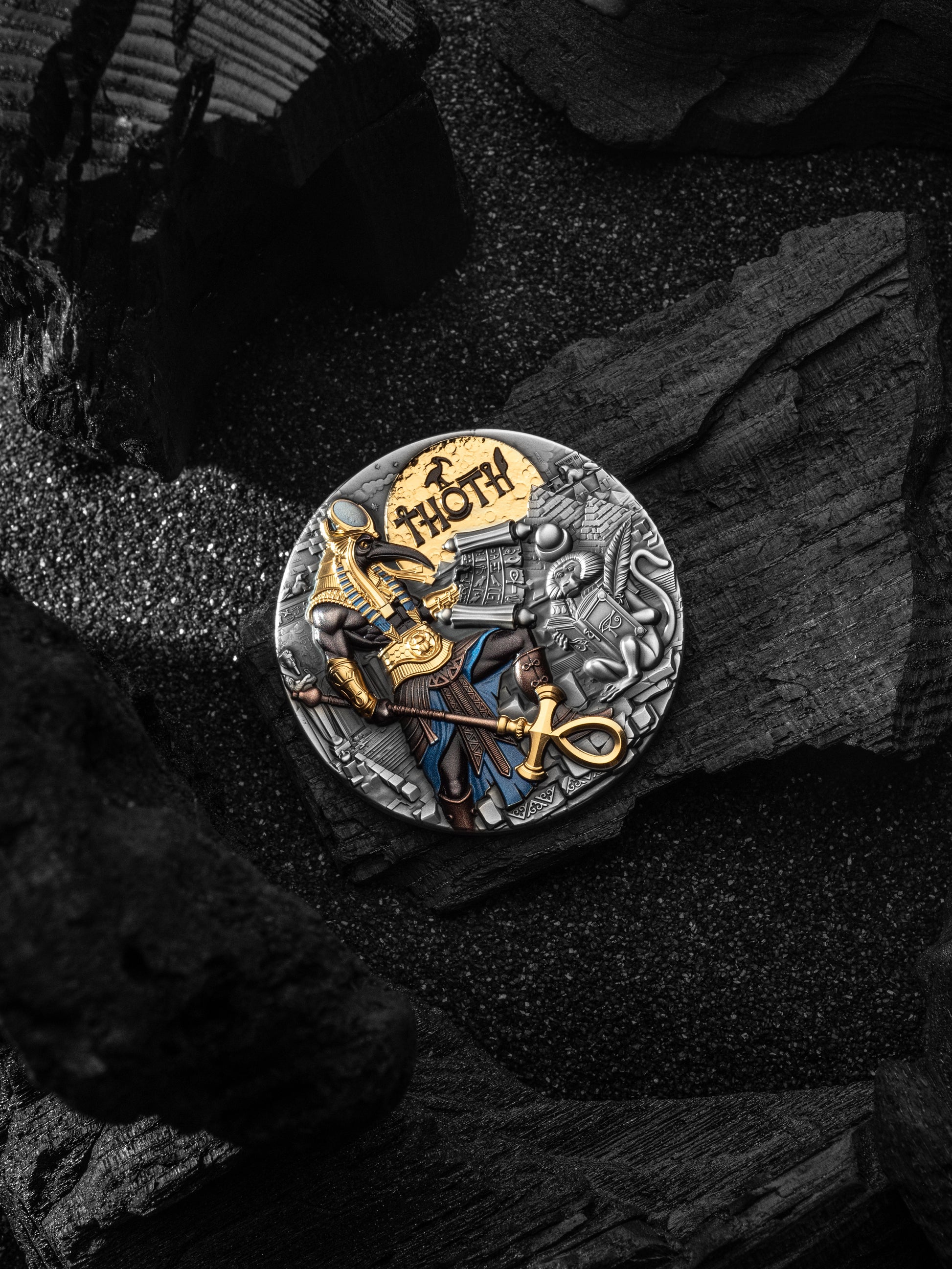 Decorative coin with intricate design on a textured surface