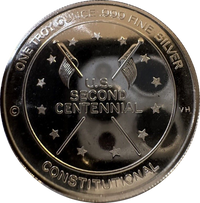 Silver coin with U.S. Second Centennial design on a white background