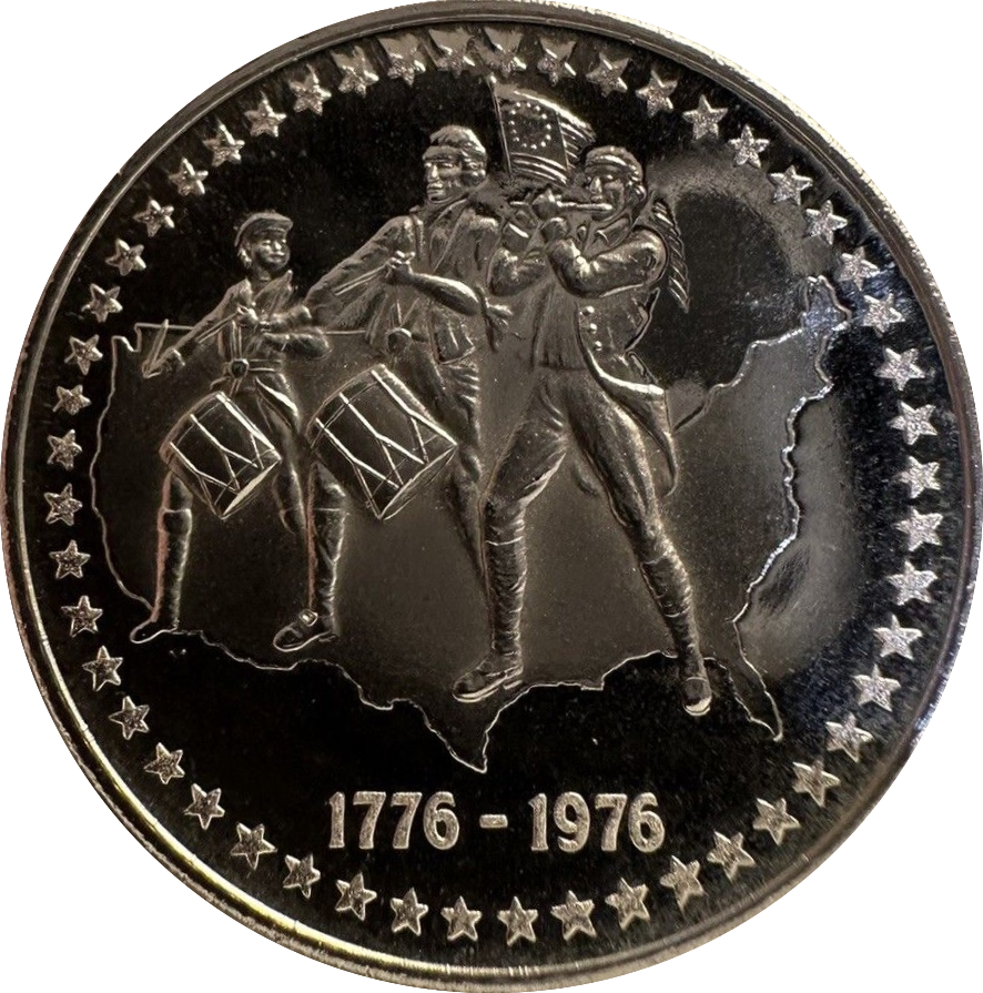 Silver coin with historical figures and stars, commemorating 1776-1976.